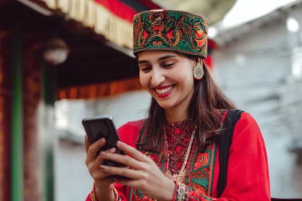 BA99 Member Login — Return to your personalized dashboard A person using their device against a moody casino-themed background, illustrating the smooth re-entry process at BA99.